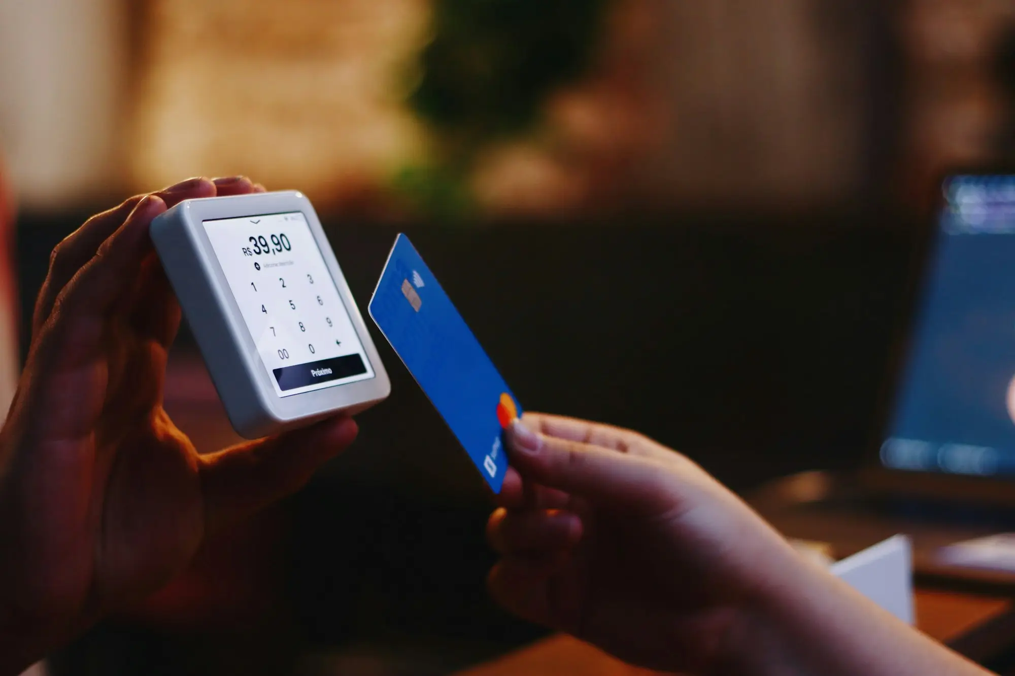 Paying by card and phone at a counter